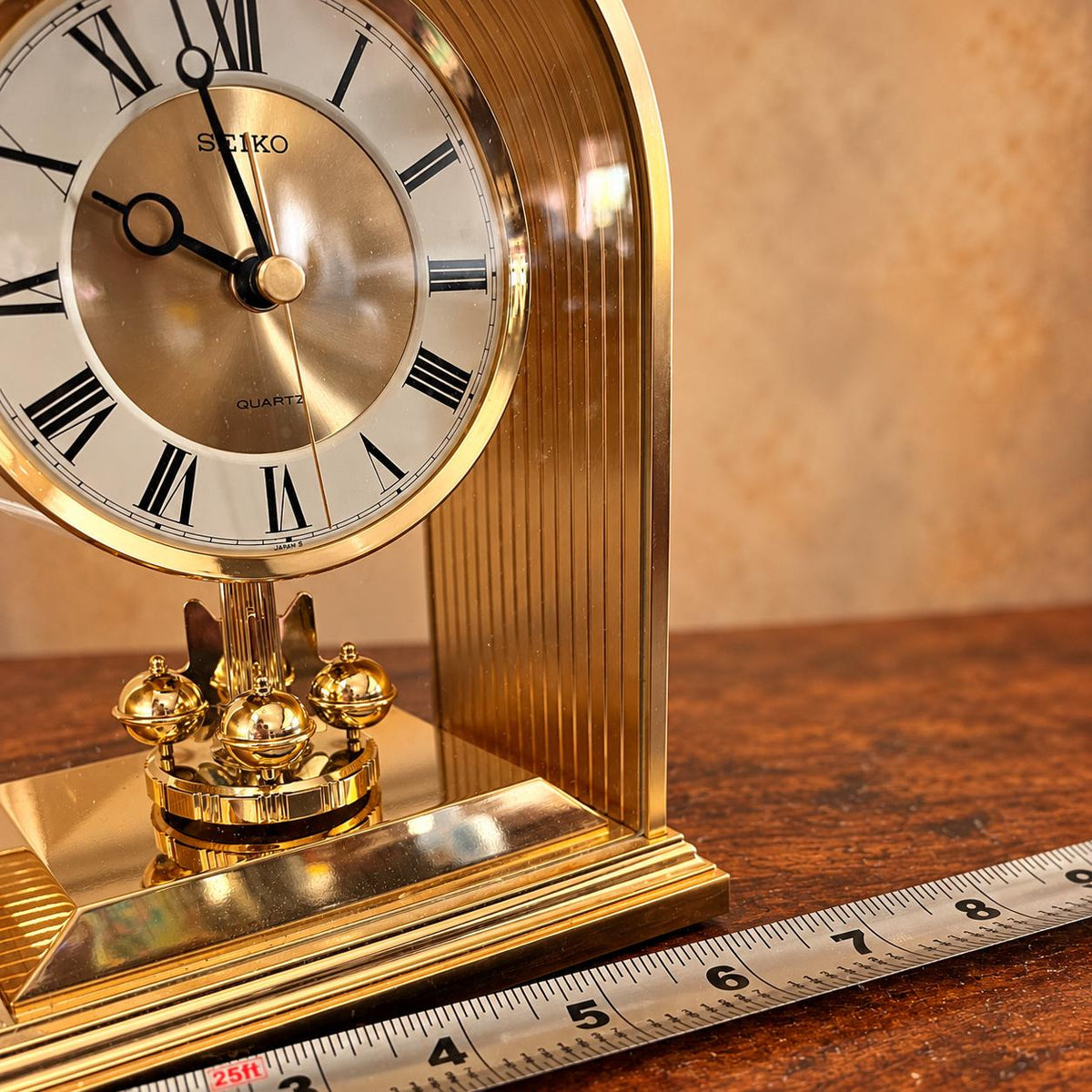 Seiko quartz anniversary mantel clock with gold-tone arch