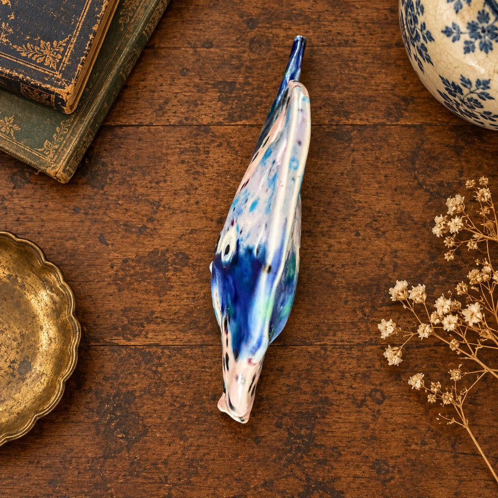 Hand crafted pottery fish sculpture with marbled blue and white glaze
