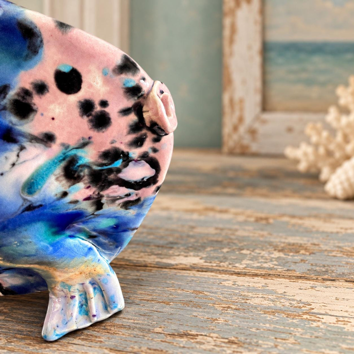 Hand crafted pottery fish sculpture with marbled blue and white glaze