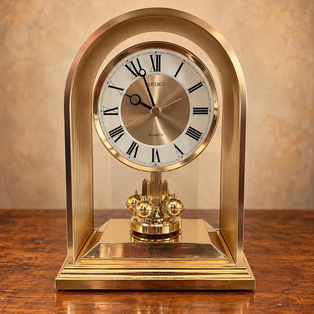 Seiko quartz anniversary mantel clock with gold-tone arch