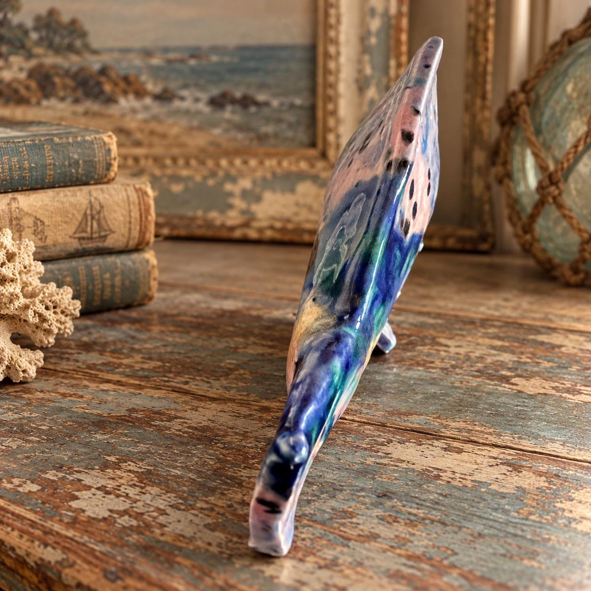 Hand crafted pottery fish sculpture with marbled blue and white glaze
