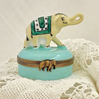 Decorative box with an elephant design on a textured surface