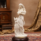 White statue on a wooden base in a room with books and furniture