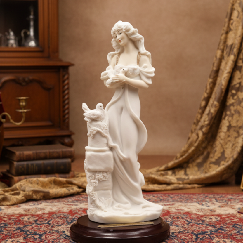 White statue on a wooden base in a room with books and furniture