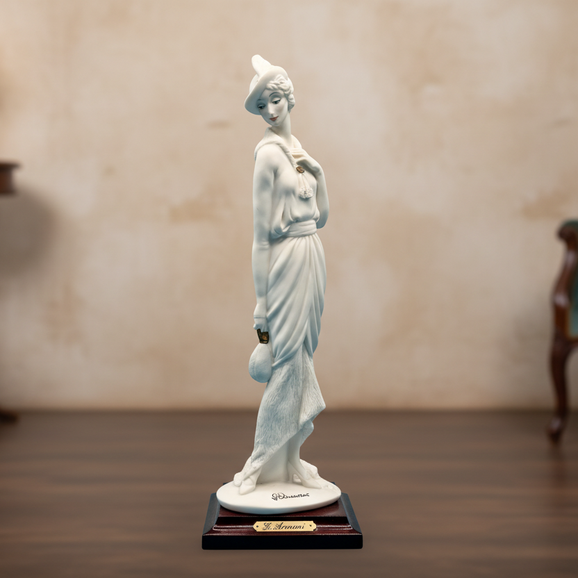 White statue on a wooden base against a blue background