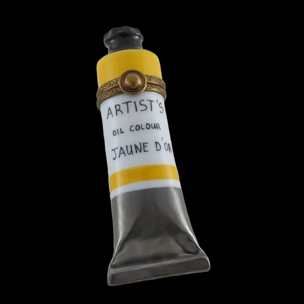 Artist's oil color tube labeled 'Jaune D'Or' on a textured white background