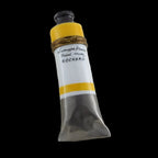 Paint tube with yellow and white design on a textured white background