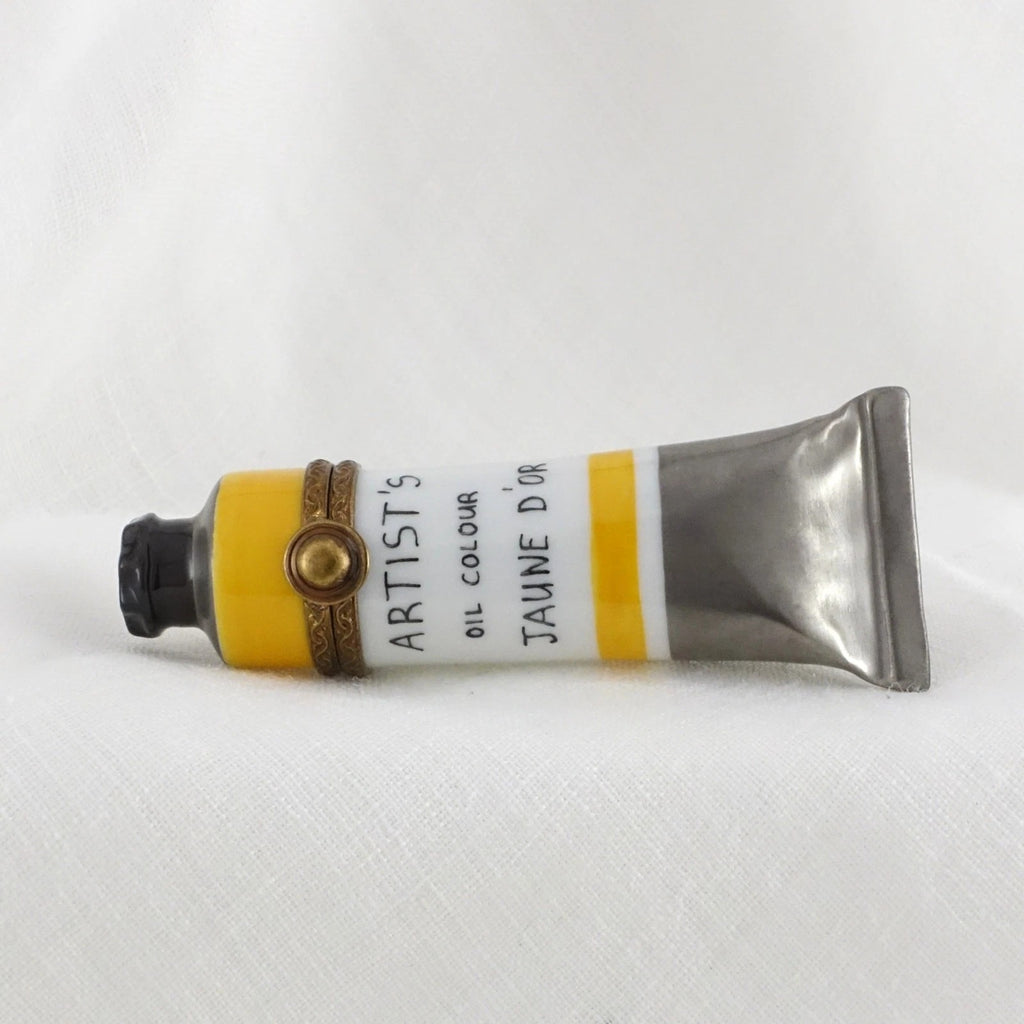 Tube of oil paint labeled 'Artists' Oil Colour' on a white background